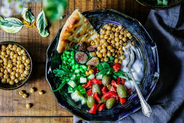 Breakfast bowl with eggs and potatoes, illustrative photo